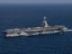 CNN:美国海军推动在建福特级航母改名,或以特朗普命名取代珍珠港英雄「多里斯·米勒」号 美国海军福特级航空母舰在海上航行,航母命名争议引发关注